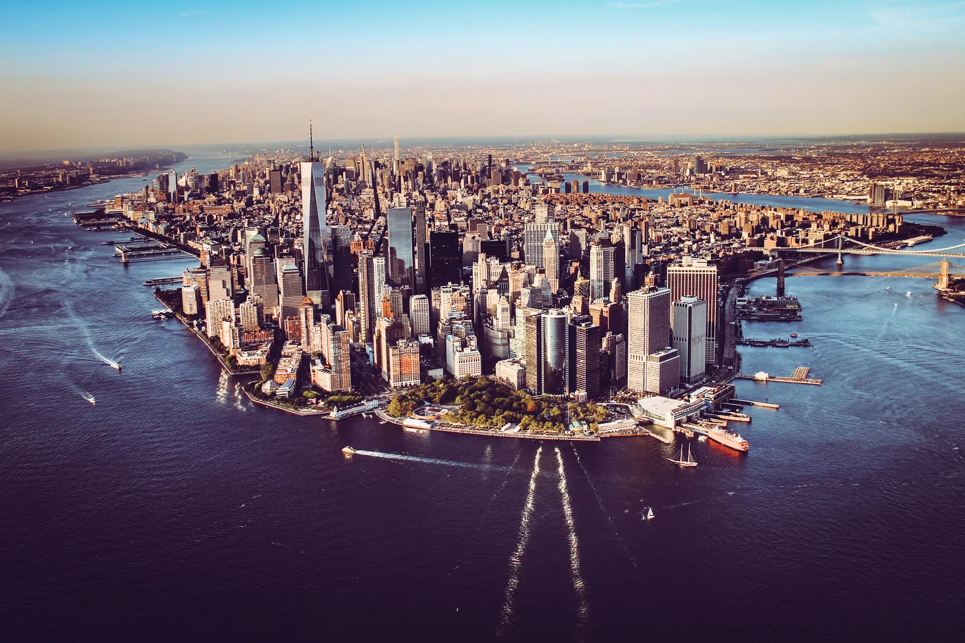 Manhattan skyline with helicopter approaching the heliport